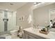 Modern bathroom featuring dual sinks, tiled shower, and stylish fixtures at 1865 Broadwell Sw St, Atlanta, GA 30310