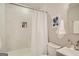 Clean bathroom featuring tiled shower, neutral color palette, and functional design at 1865 Broadwell Sw St, Atlanta, GA 30310