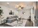 Inviting living room featuring hardwood floors, neutral walls, ceiling fan, and stylish decor at 1865 Broadwell Sw St, Atlanta, GA 30310