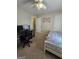 Neutral bedroom with carpet, desk, single bed, and a personalized 'Emery Kay' wall decoration at 220 Jackson Rd, Mcdonough, GA 30252