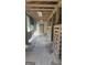 Interior view of the barn showcasing stalls and an open walkway at 1100 Kinnett Rd, Covington, GA 30016