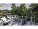 Relaxing outdoor deck featuring comfortable seating and serene views of the lush greenery at 9742 Fallview Ct, Villa Rica, GA 30180