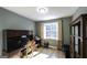 Bedroom featuring desk and chair and neutral walls at 9742 Fallview Ct, Villa Rica, GA 30180