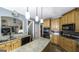 Bright open kitchen featuring granite countertops, stainless steel appliances and eat-in breakfast area at 9742 Fallview Ct, Villa Rica, GA 30180