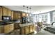 Well-equipped kitchen featuring granite countertops, stainless steel appliances, and a breakfast area at 9742 Fallview Ct, Villa Rica, GA 30180