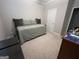 Bedroom with a twin bed, a vanity and desk and carpeted floors at 3608 Davenport Rd, Duluth, GA 30096