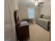 Bedroom with a twin bed, a vanity and desk and carpeted floors at 3608 Davenport Rd, Duluth, GA 30096