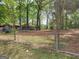 Spacious backyard with mature trees, offering plenty of space for outdoor activities at 957 Astor Ave, Forest Park, GA 30297