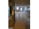 Spacious basement area with tiled flooring, windows, and neutral colored walls at 957 Astor Ave, Forest Park, GA 30297
