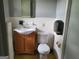 Modest bathroom with single sink vanity and standard toilet at 957 Astor Ave, Forest Park, GA 30297