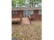 Exterior view of the deck in the backyard, perfect for relaxing at 957 Astor Ave, Forest Park, GA 30297