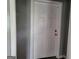 Interior view of a standard white painted paneled door at 957 Astor Ave, Forest Park, GA 30297
