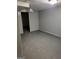Interior shot of the home showing a room with painted floors at 957 Astor Ave, Forest Park, GA 30297