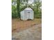 Exterior view of the home's backyard storage shed at 957 Astor Ave, Forest Park, GA 30297