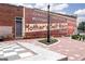 Vintage brick building with an advertising mural adds historical charm to the urban landscape, enhanced by a checkered walkway at 602 Belshire Dr, Acworth, GA 30102