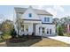 Attractive two-story new construction home with a covered porch, craftsman features and professional landscaping at 602 Belshire Dr, Acworth, GA 30102