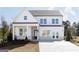 Attractive two-story new construction home with a covered porch, craftsman features and professional landscaping at 602 Belshire Dr, Acworth, GA 30102