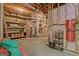 Unfinished basement with pink insulated walls and shelving for storage, perfect for organizing at 1214 Weatherstone Way, Peachtree City, GA 30269