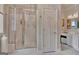 Well-appointed bathroom with a glass-enclosed shower and vanity at 1214 Weatherstone Way, Peachtree City, GA 30269