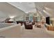 Bonus room with pool table, TV, recliners, and lots of natural light at 1214 Weatherstone Way, Peachtree City, GA 30269