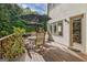 Open back deck with a table, chairs, and outdoor furniture ideal for entertaining at 1214 Weatherstone Way, Peachtree City, GA 30269