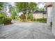 This home has a very long driveway, mature trees, and professional landscaping at 1214 Weatherstone Way, Peachtree City, GA 30269
