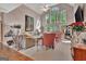 Bright living room with vaulted ceilings, large windows, stylish furniture, and ample natural light at 1214 Weatherstone Way, Peachtree City, GA 30269