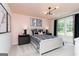 Well-lit bedroom with stylish furniture, modern light fixtures, and decor at 608 Belshire Dr, Acworth, GA 30102