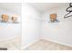 Walk-in closet with wire shelving and storage baskets for optimal organization at 608 Belshire Dr, Acworth, GA 30102