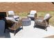 Outdoor patio featuring a seating area with a fire pit, perfect for entertaining at 608 Belshire Dr, Acworth, GA 30102
