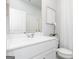 Fresh, all-white bathroom design with modern sink and decor at 502 Regency Trl, Acworth, GA 30102