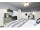 Bedroom featuring two-tone walls, carpet, and a wall mirror above the dresser at 502 Regency Trl, Acworth, GA 30102