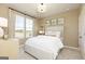 Comfortable bedroom with a large window, neutral decor, and a serene ambiance at 502 Regency Trl, Acworth, GA 30102