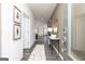 Welcoming entryway showcasing modern decor, hardwood floors, and a view into the living space at 502 Regency Trl, Acworth, GA 30102