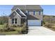 Attractive two-story brick home featuring a two-car garage and well-maintained landscaping at 502 Regency Trl, Acworth, GA 30102