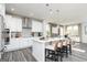 Bright, modern kitchen with white cabinets, stainless steel appliances, and island seating at 502 Regency Trl, Acworth, GA 30102