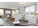 Bright and spacious living room blending seamlessly with dining area and modern furnishings at 502 Regency Trl, Acworth, GA 30102