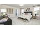 Bright main bedroom with neutral walls, a padded headboard, and gold accents at 502 Regency Trl, Acworth, GA 30102