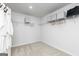 Well-organized walk-in closet with wire shelving and plush carpeting at 502 Regency Trl, Acworth, GA 30102