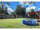 Backyard with above ground pool at 11367 Vinea Ln, Hampton, GA 30228