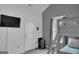 Shared bedroom with a bunk bed, a TV on the wall and views of the window at 11367 Vinea Ln, Hampton, GA 30228