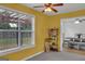 Inviting bonus room with a view of dining room at 11367 Vinea Ln, Hampton, GA 30228