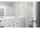 Bathroom featuring a double vanity, framed mirror, and a walk-in shower at 407 Newland Way, Acworth, GA 30102