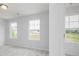 Bright bedroom features multiple windows offering lots of natural light at 407 Newland Way, Acworth, GA 30102