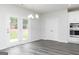 Dining Room area with glass panel doors leading to the backyard at 407 Newland Way, Acworth, GA 30102