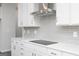 White quartz countertops and subway tile backsplash in kitchen at 407 Newland Way, Acworth, GA 30102