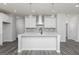 Kitchen island with white countertop, black faucet and decorative pendant lights at 407 Newland Way, Acworth, GA 30102