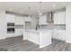 Kitchen with stainless steel appliances and white cabinets at 407 Newland Way, Acworth, GA 30102