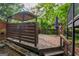 Large deck with privacy wall and space for planting and relaxing outdoors at 1772 Martin Se Pl, Smyrna, GA 30080