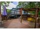 Large deck with sheltered area for outdoor relaxing and entertaining at 1772 Martin Se Pl, Smyrna, GA 30080
